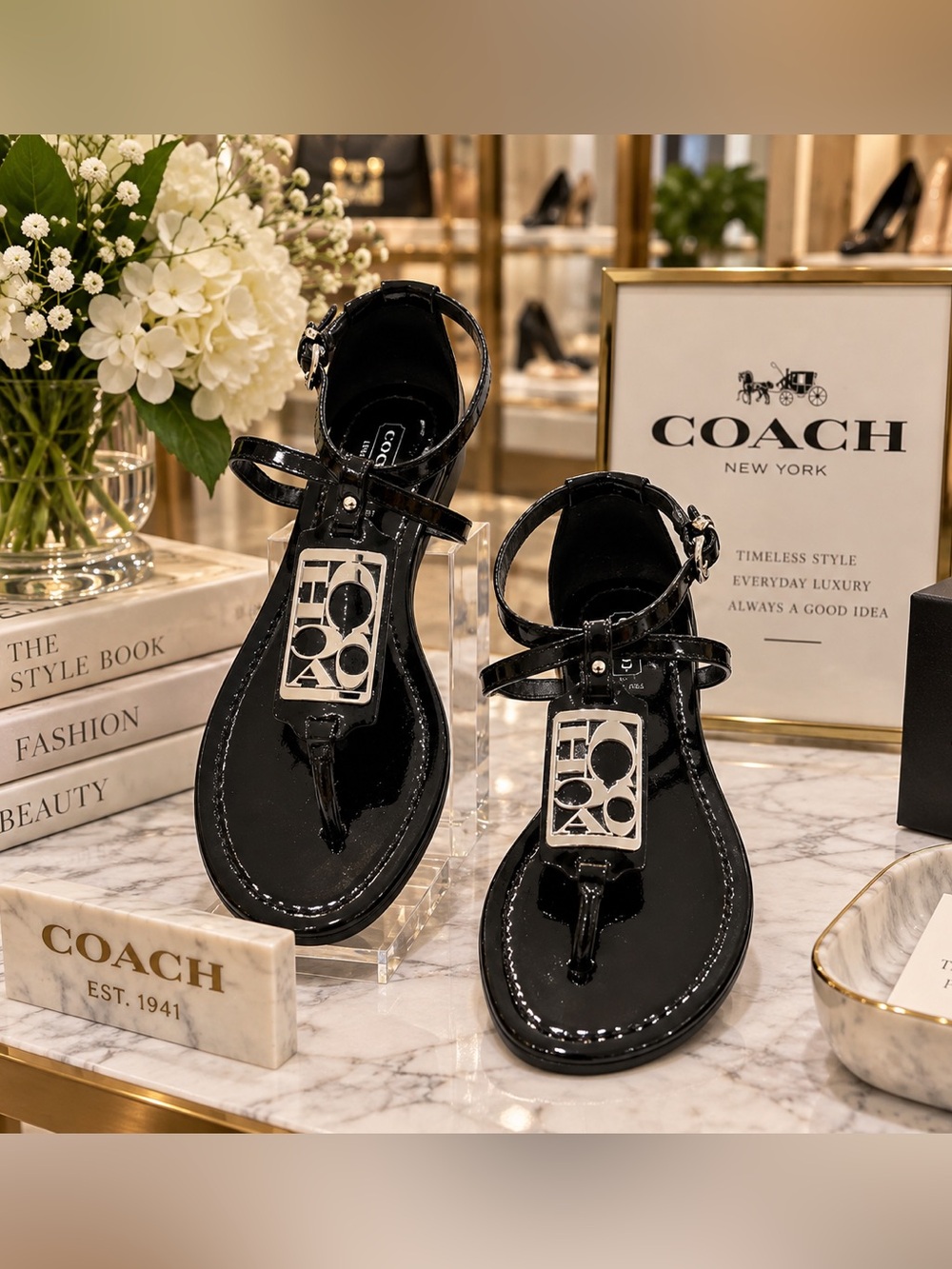 Coach Black Patent Leather “ Odelle” Flat T-Strap Signature Silver Hardware